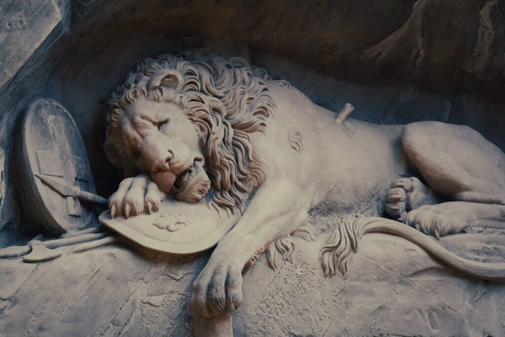 Sculpture of a dying lion in Lucerne, symbolizing Swiss Guard bravery.